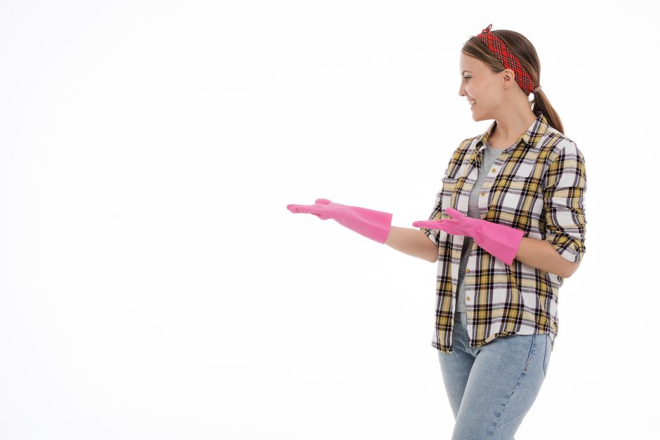 Professional house cleaner smiling